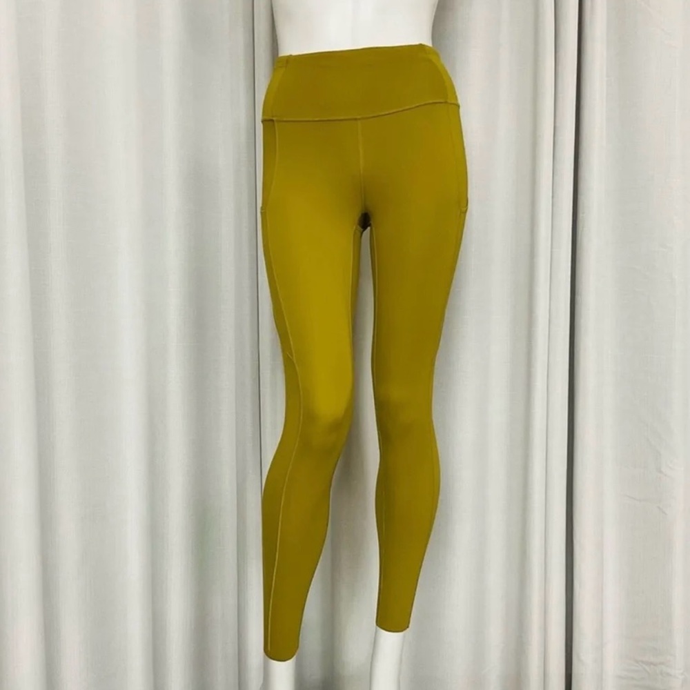 Lululemon Fast Free High-Rise Tight.      Color Gold. Size 8